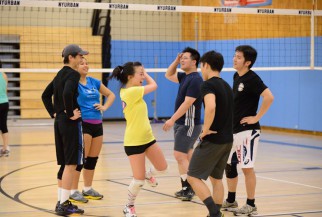 Players enjoying nyc coed volleyball league game