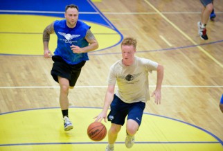 Nyc Basketball League player dribbling to the Hoop