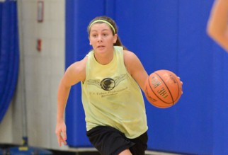 Intense woman basketball player