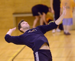 Man spiking volleyball