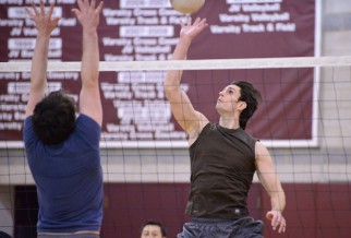 Male Volleyball Player Dinks ball