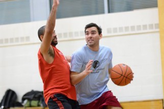 Going to the hoop at Trinity HS site of NYC basketball league game in NY