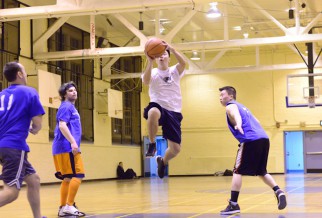 Player jumps high in NYC summer basketball league