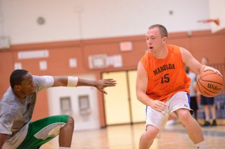 Marolda controls the ball in Nyc Basketball league game