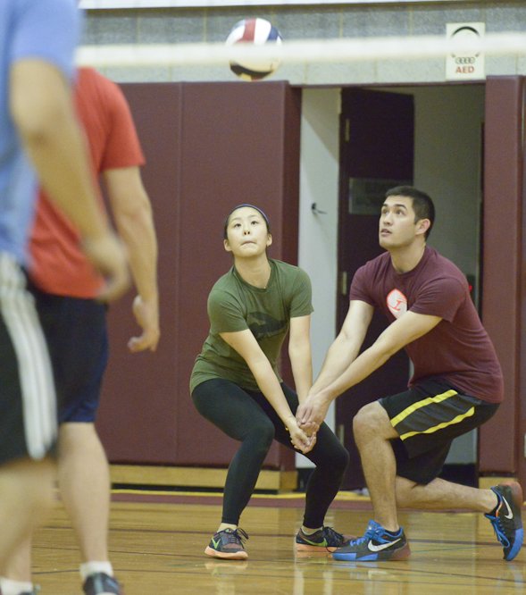 players try to bump the ball