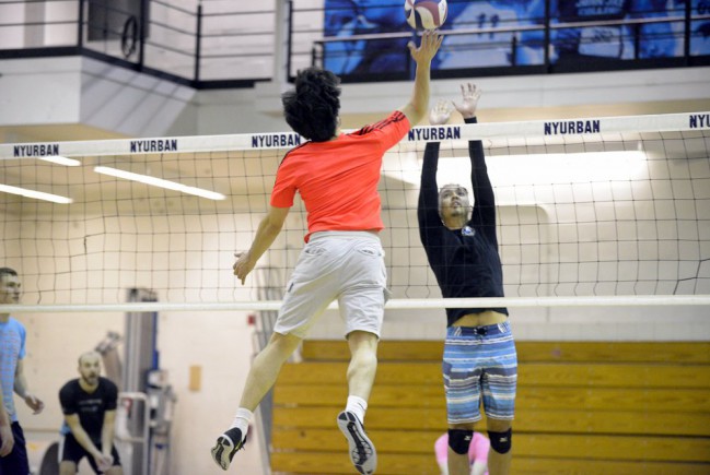 Player blocks the volleyball