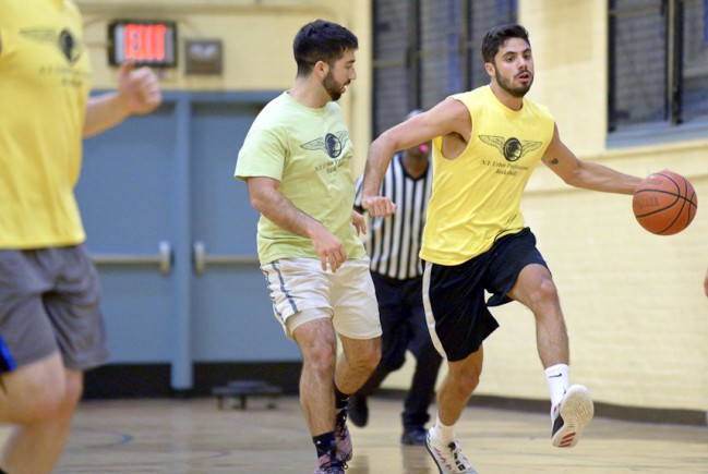 player dribbles to the hoop